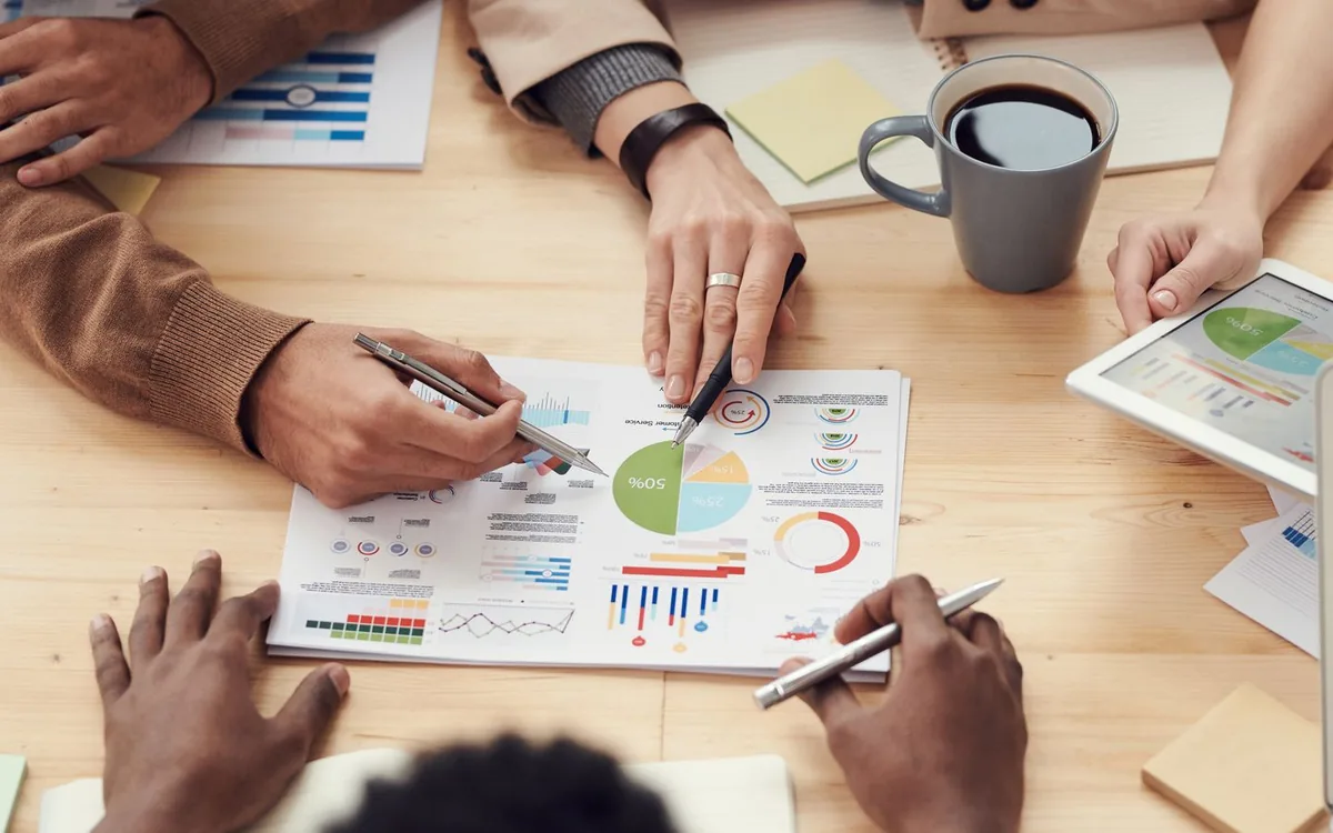 Marketing team planning campaigns with audience insights and visual materials