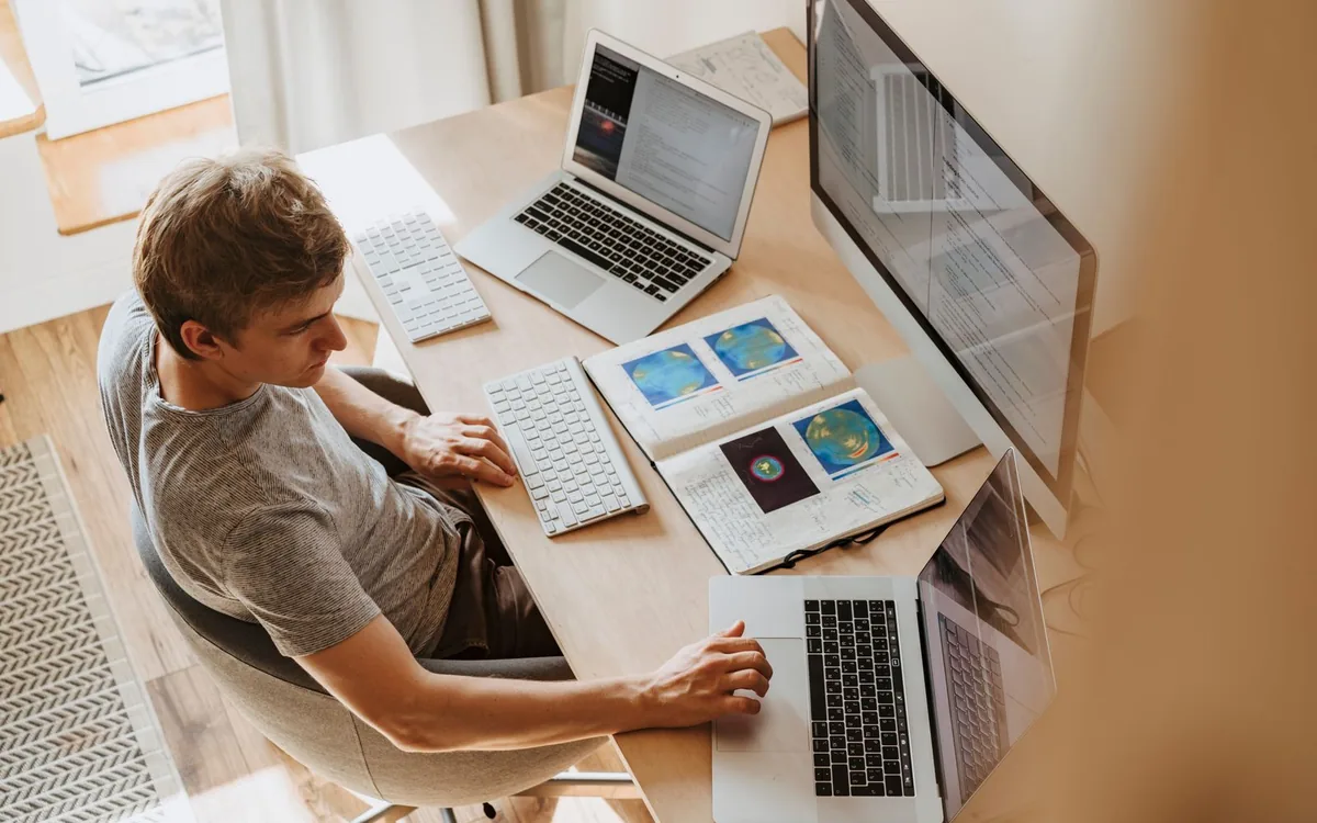Developer working at a laptop to build reliable software products
